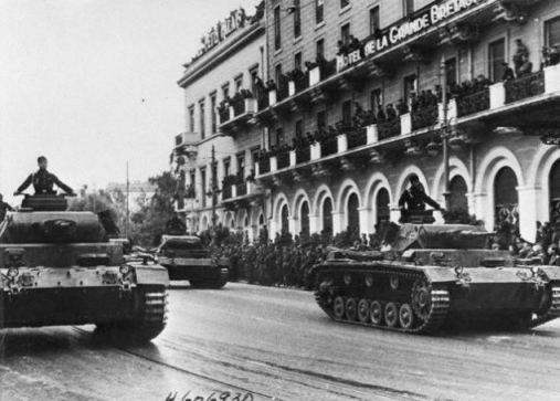 German Tanks Rumbling Through Streets